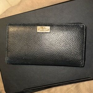 Kate Spade Excellent condition Black leather checkbook wallet.